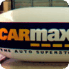 advertising blimps made in the USA. Great way to increase visibility. Blimp with CarMax logo